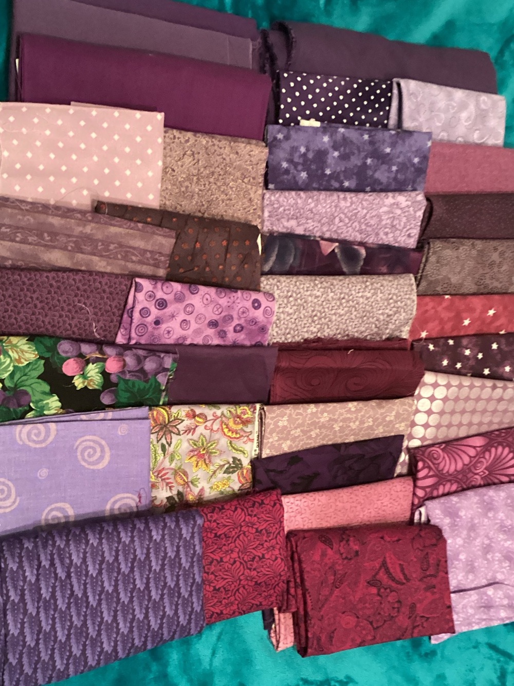 Assorted purple fabrics